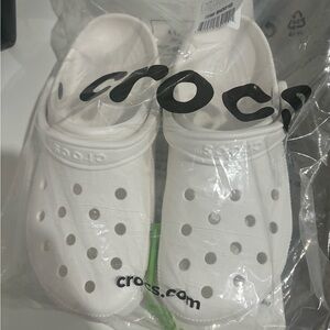 Brand new white crocs size 9 in men 11 in women